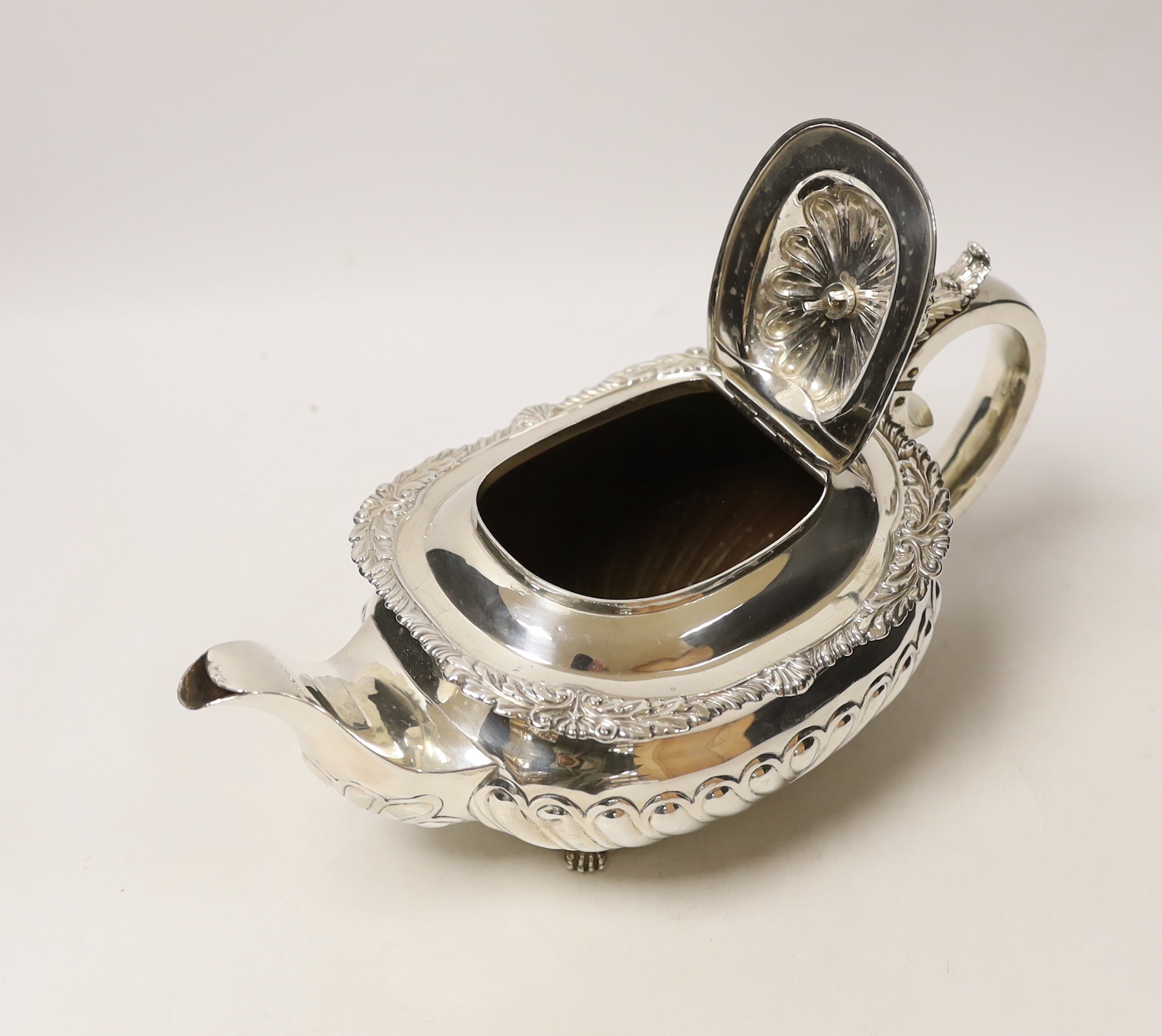 A George IV demi-fluted silver oval tea pot, maker RP, London, 1823, gross weight 23.2oz, CITES Submission reference, 4XP4B3AZ
